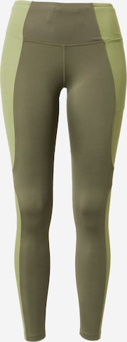 NIKE Skinny Workout Pants in Green: front