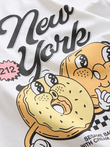 Next Μπλουζάκι 'New York Bagel' σε λευκό