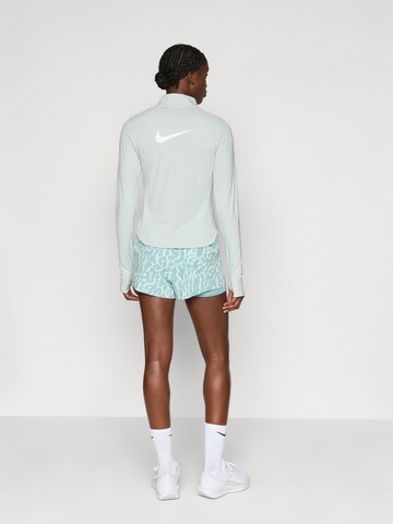 NIKE Обычный Спортивные штаны 'Swift' в Зеленый