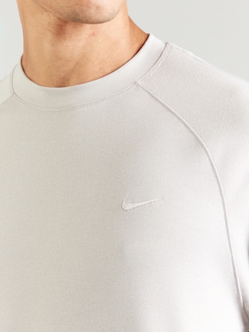 NIKESportska sweater majica 'Primary' - siva boja