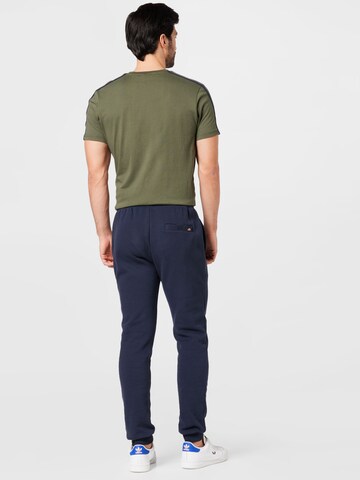 Tapered Pantaloni di ELLESSE in blu