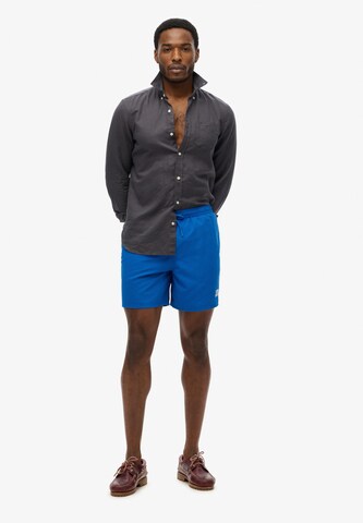 Shorts de bain 'Essential' Superdry en bleu