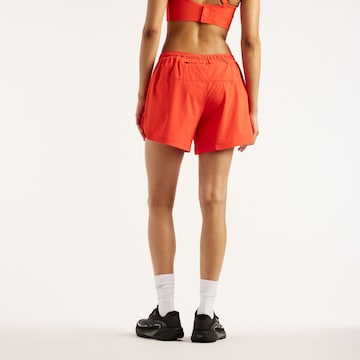 new balance Regular Sports trousers 'RC Essential Short 5"' in Orange