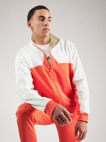 ADIDAS SPORTSWEAR Спортна жилетка с качулка 'Tiro' в оранжево