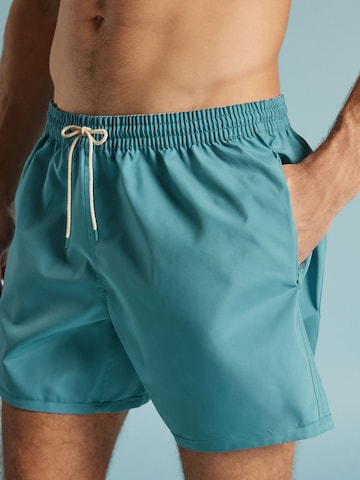 IUMAN Intimissimi Board Shorts in Blue