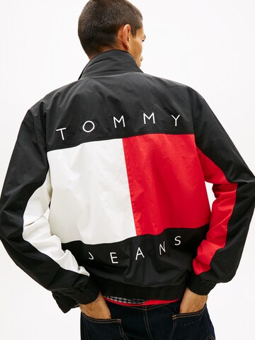 Tommy Jeans Kevad-sügisjope 'HERITAGE', värv must: eest vaates