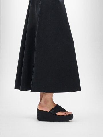 FitFlop T-Bar Sandals in Black: front