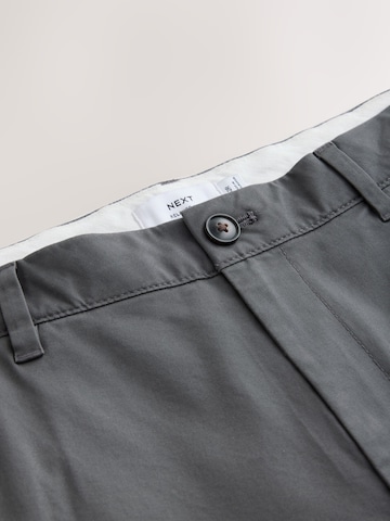 Largi Pantaloni eleganți de la Next pe gri