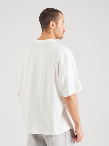 Champion Authentic Athletic Apparel - Camiseta funcional en blanco