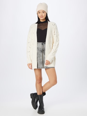 ABOUT YOU Knit Cardigan 'Goldie' in Beige