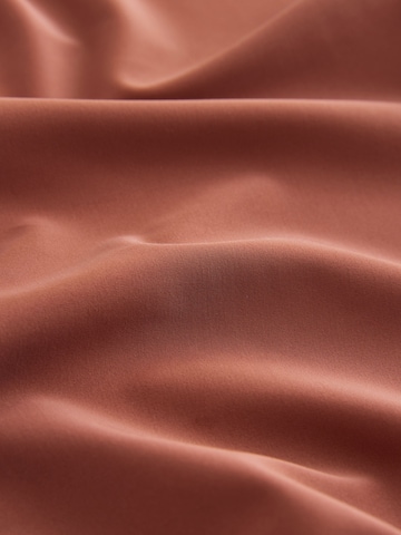 Next - Protección UV en marrón