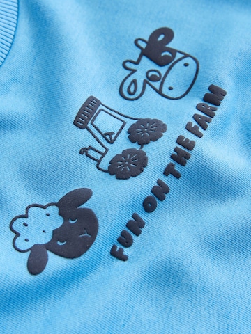 Next - Ropa para correr en azul