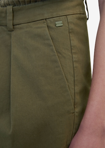 Marc O'Polo DENIM Ohlapna forma Chino hlače | zelena barva