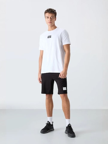 Tommy Life - Fato de desporto em preto: frente