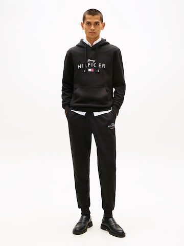 TOMMY HILFIGER Joggingpak in Zwart: voorkant