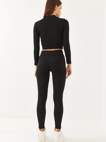 Pantalons de tailleur Bianco Lucci en noir