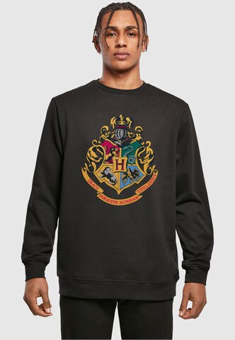 ABSOLUTE CULT Sweatshirt 'Harry Potter - Hogwarts Crest Gold' in Black: front