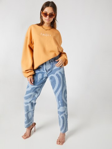 Smiles Sweatshirt 'Milo' i orange