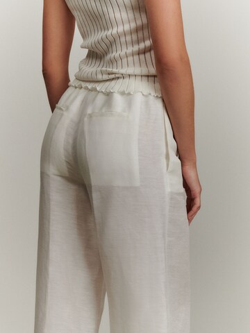 ABOUT YOU x Marie von Behrens Wide leg Trousers with creases 'Emelie' in White