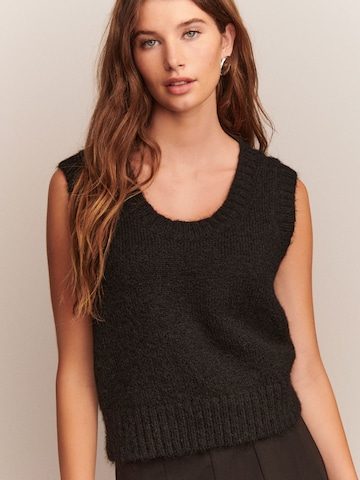 Next Sweater in Black: front