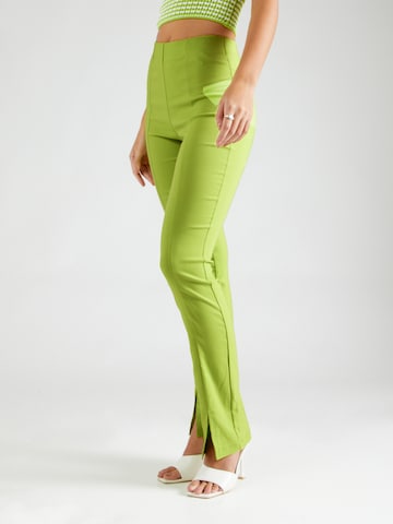ABOUT YOU x Laura Giurcanu Flared Pants 'Joelle' in Green