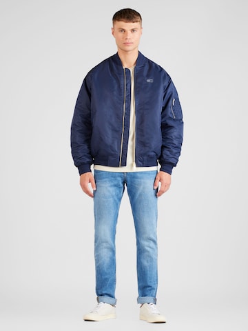 Tommy Jeans Prehodna jakna 'Authentic' | modra barva
