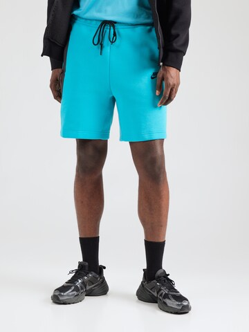 Nike Sportswear Свободный крой Штаны 'TCH FLC' в Зеленый: спереди