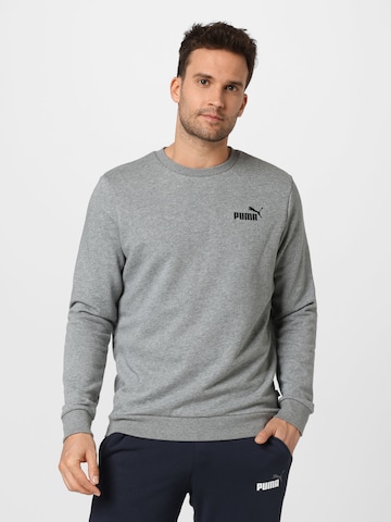 PUMA Sportsweatshirt 'Essentials' in Grijs: voorkant