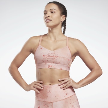 Reebok - Bustier Sujetador deportivo en rosa: frente