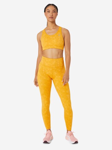 ASICSSkinny Sportske hlače - žuta boja