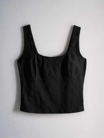 The Set Top in Schwarz