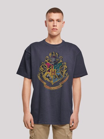T-Shirt 'Harry Potter Distressed Hogwarts' F4NT4STIC en bleu : devant