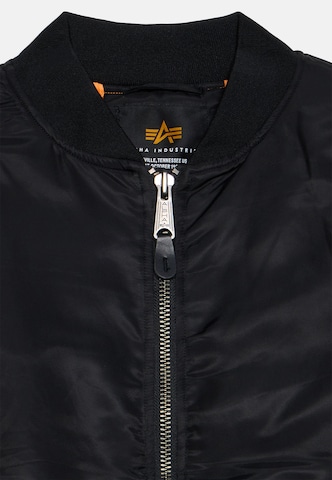 ALPHA INDUSTRIES Välikausitakki 'MA-1' värissä musta