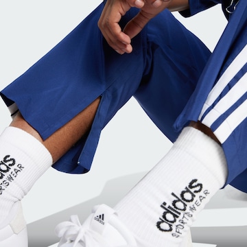 ADIDAS SPORTSWEAR Regular Urheiluhousut 'Essentials' värissä sininen