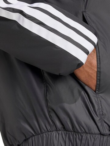 ADIDAS SPORTSWEAR Αθλητικό μπουφάν 'ESS' σε μαύρο