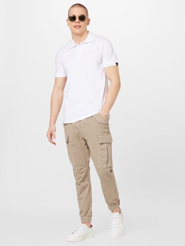 ALPHA INDUSTRIES - Tapered Pantalón cargo 'Airman' en beige