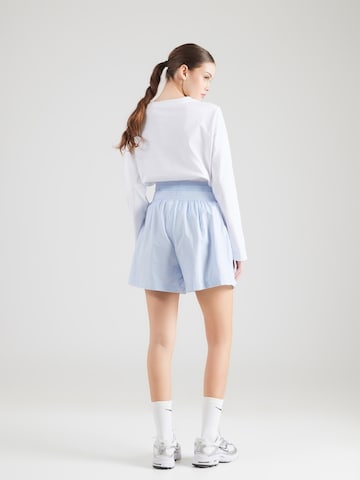 Largi Pantaloni de la Nike Sportswear pe albastru