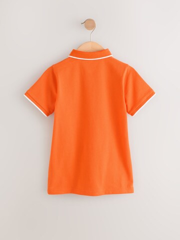 T-Shirt Next en orange