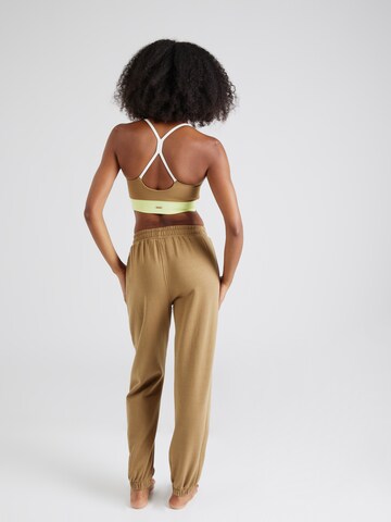 Athlecia Tapered Workout Pants 'Asport' in Brown