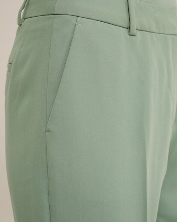 WE Fashion Slimfit Spodnie w kant w kolorze zielony