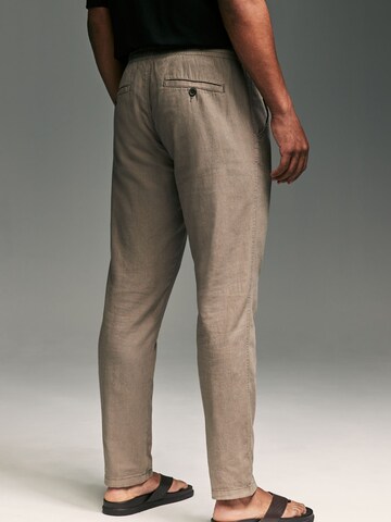 regular Pantaloni di Next in grigio