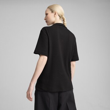 PUMA Blouse 'Wardrobe Ess' in Zwart