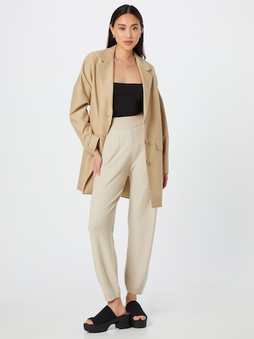 Karo Kauer Loose fit Trousers in Beige