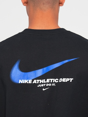 Nike Sportswear - Camisa em preto
