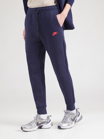 Nike Sportswear Конический (Tapered) Штаны 'TCH FLC' в Синий: спереди