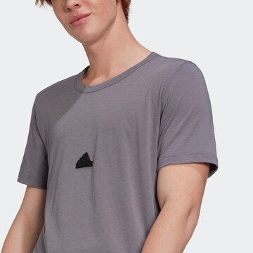ADIDAS SPORTSWEAR Funkcionalna majica 'New Fit' | rjava barva
