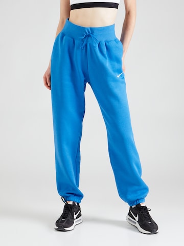 Tapered Pantaloni 'Phoenix Fleece' de la Nike Sportswear pe albastru: față