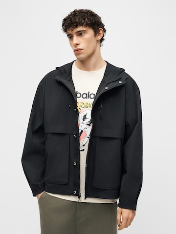 new balance Преходно яке в черно