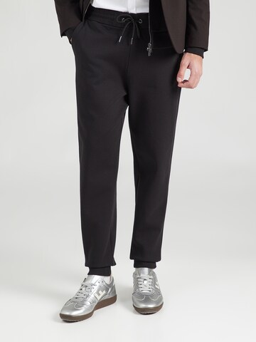 BOSS Alt kitsenev Püksid 'Locsin', värv must: eest vaates