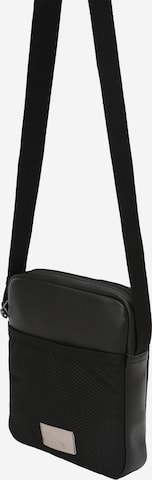 Sac à bandoulière Calvin Klein Jeans en noir